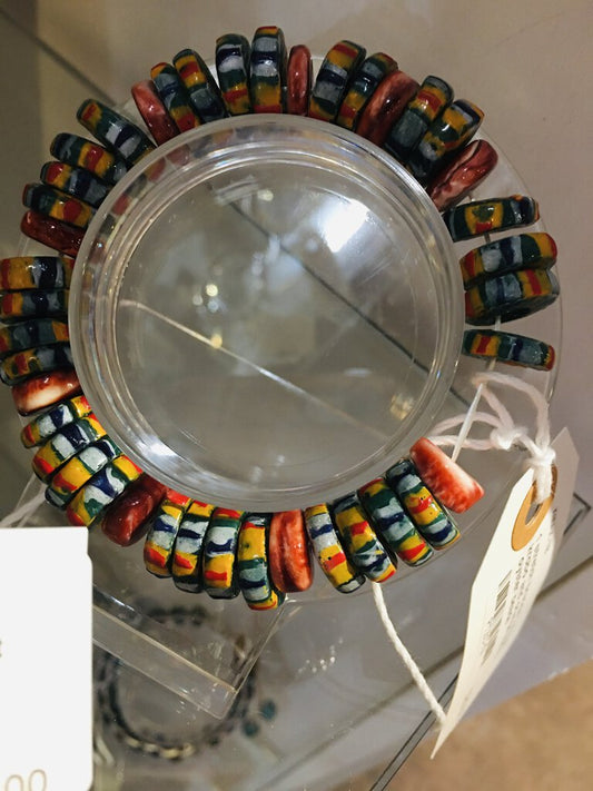 1 stretch bracelet; african krobo and orange spiney oyster beads