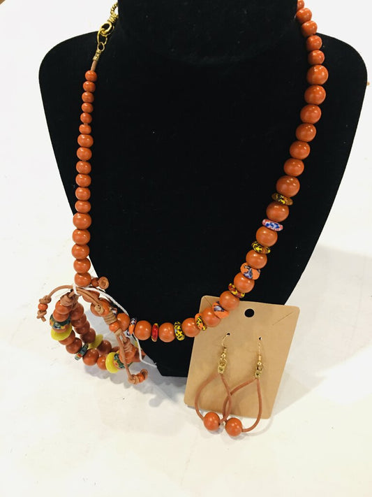orange wood beads, ghanaian glass beads,leather. necklace, earring and bracelet. 3 pc set